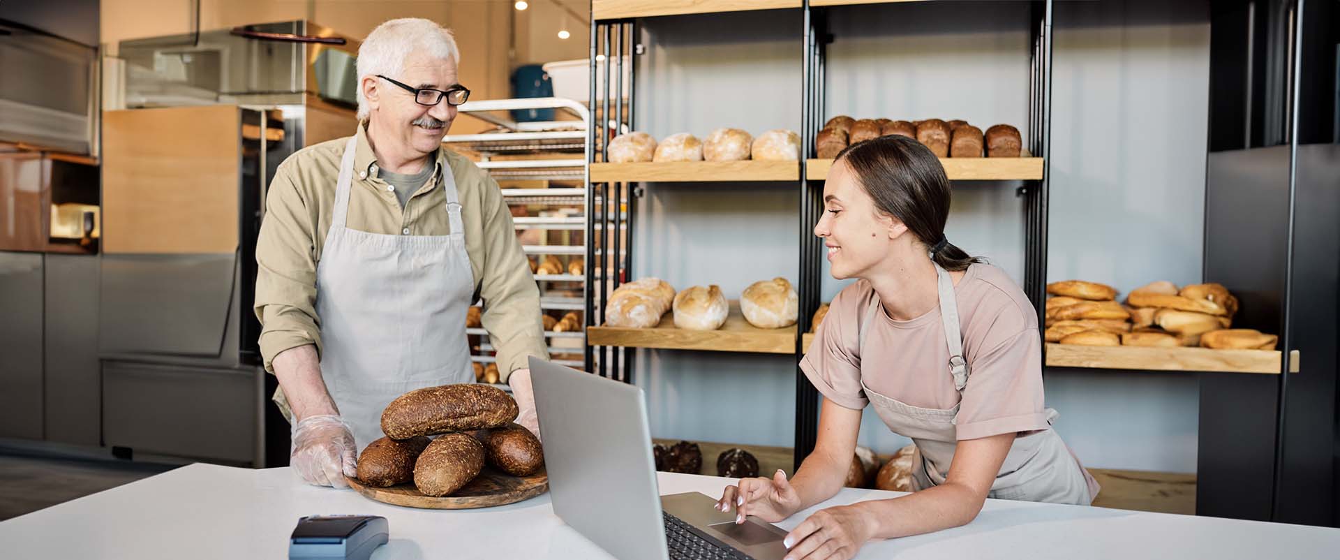 Delicious Bakes employees discuss increasing sales and their website's ability to handle the bakery's record demands. 