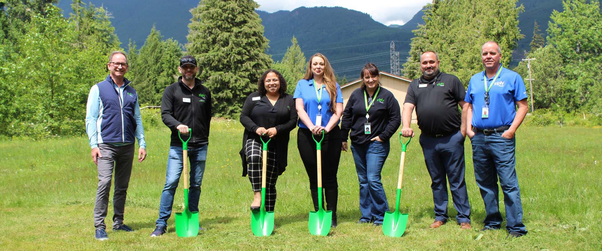 Group of Ziply Fiber employees use shovels to break ground for fast fiber internet in Snohomish County. 