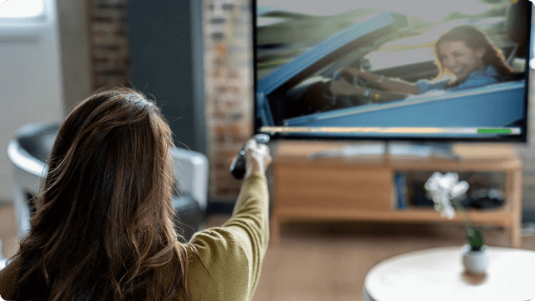 Person streaming TV with Ziply Fiber