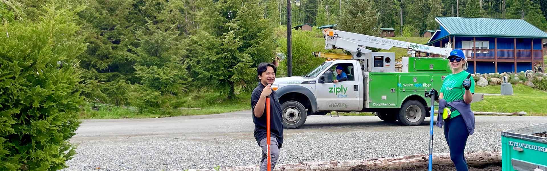 Ziply Fiber employee working with a nonprofit volunteer to install fiber-optic internet