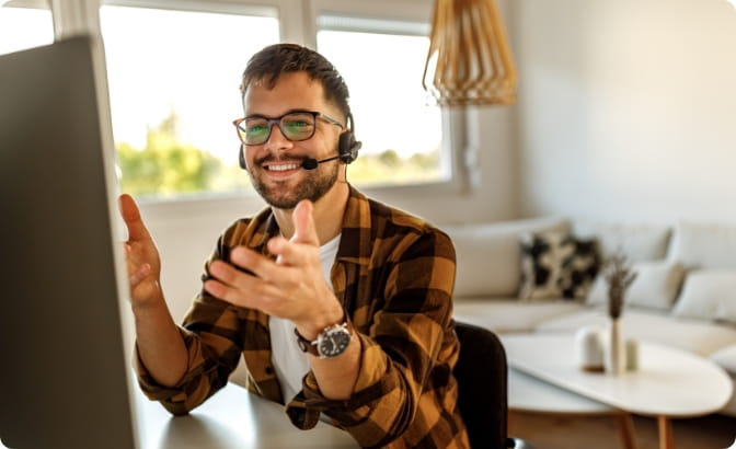 Man using headset to talk in his home