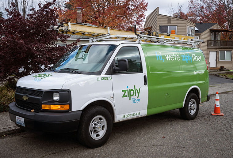 ziply fiber work truck on road with leaves