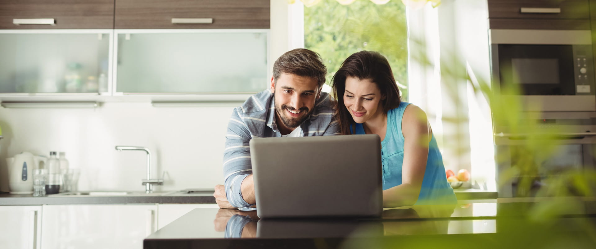 A couple uses high-speed internet in their home