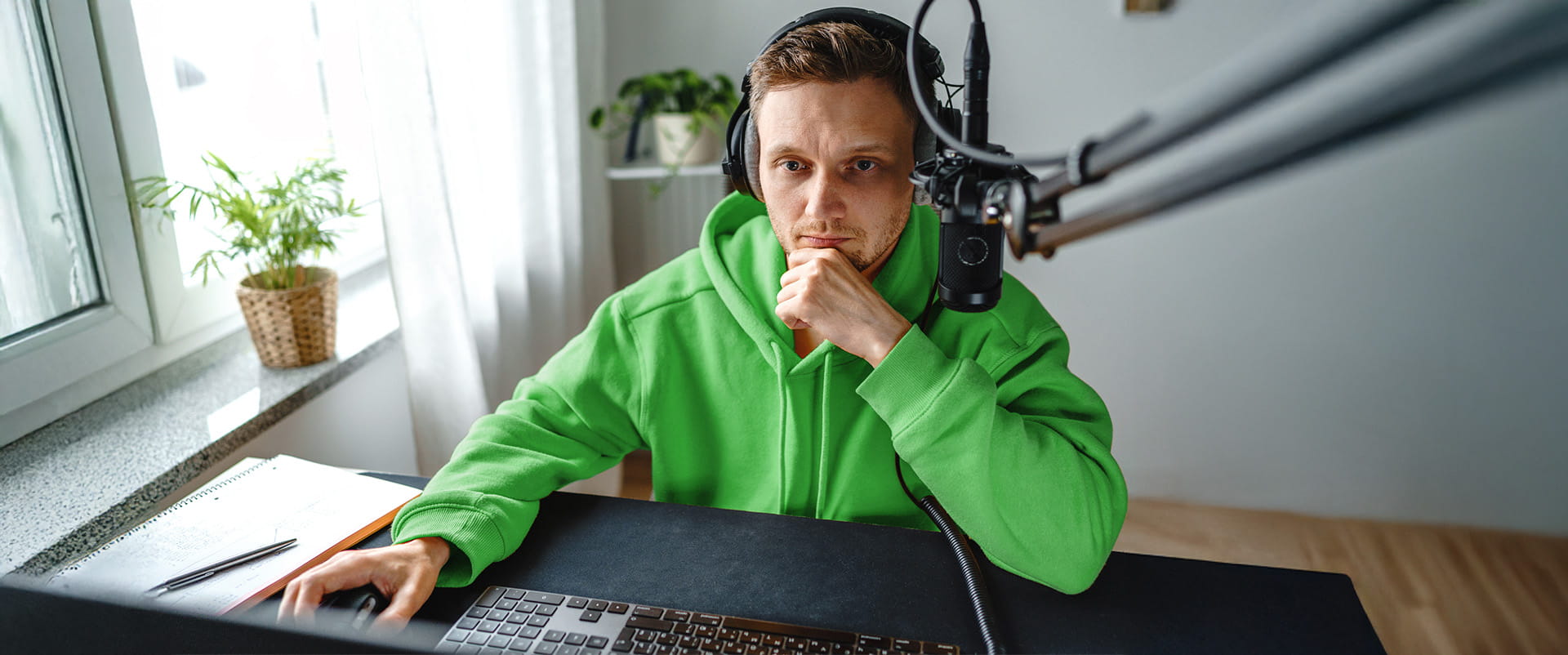 A customer uses high-speed 10-gig fiber internet to create a podcast