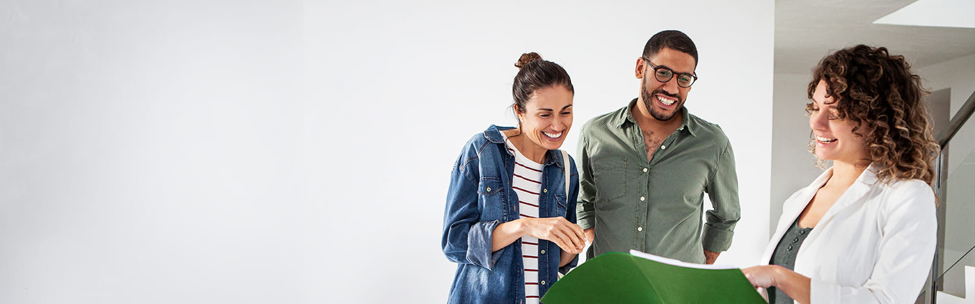 Couple discusses fiber internet availability with their leasing agent.