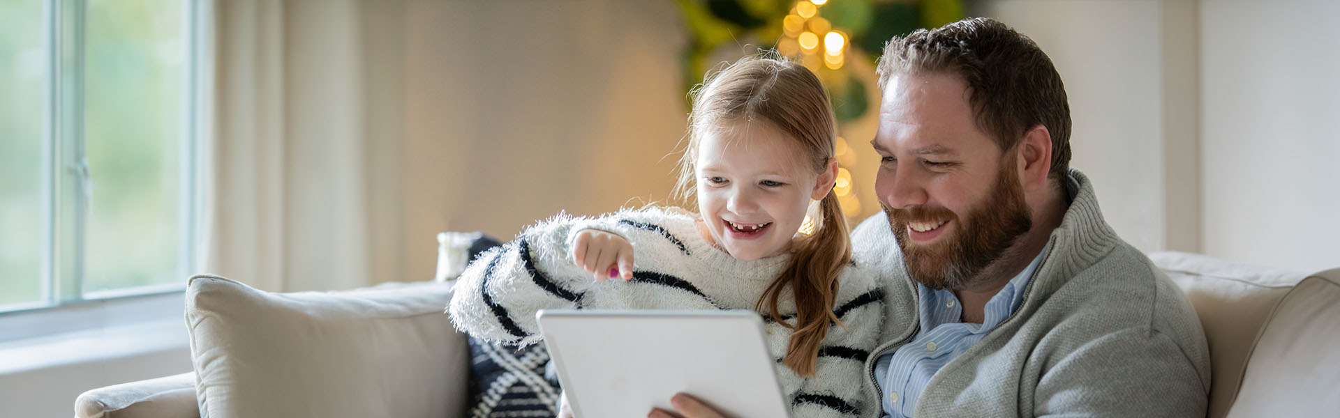 Adult and child enjoying Gig speed internet in Brookings