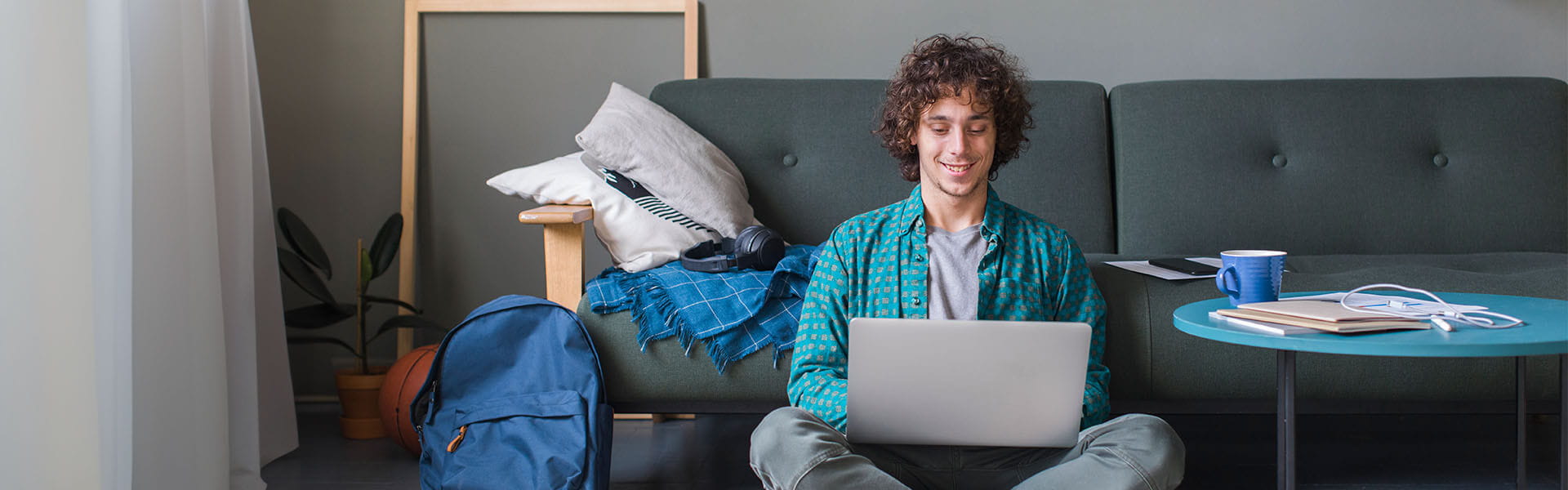 Student browsing next semester's course options on a laptop connected to Ziply Fiber's lightening fast network. 