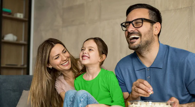 Family enjoys a bowl of popcorn while streaming the latest animated adventure in brilliant 8K resolution. 